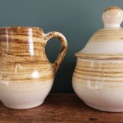 Sugar bowl and milk jug in Longchamp earthenware.