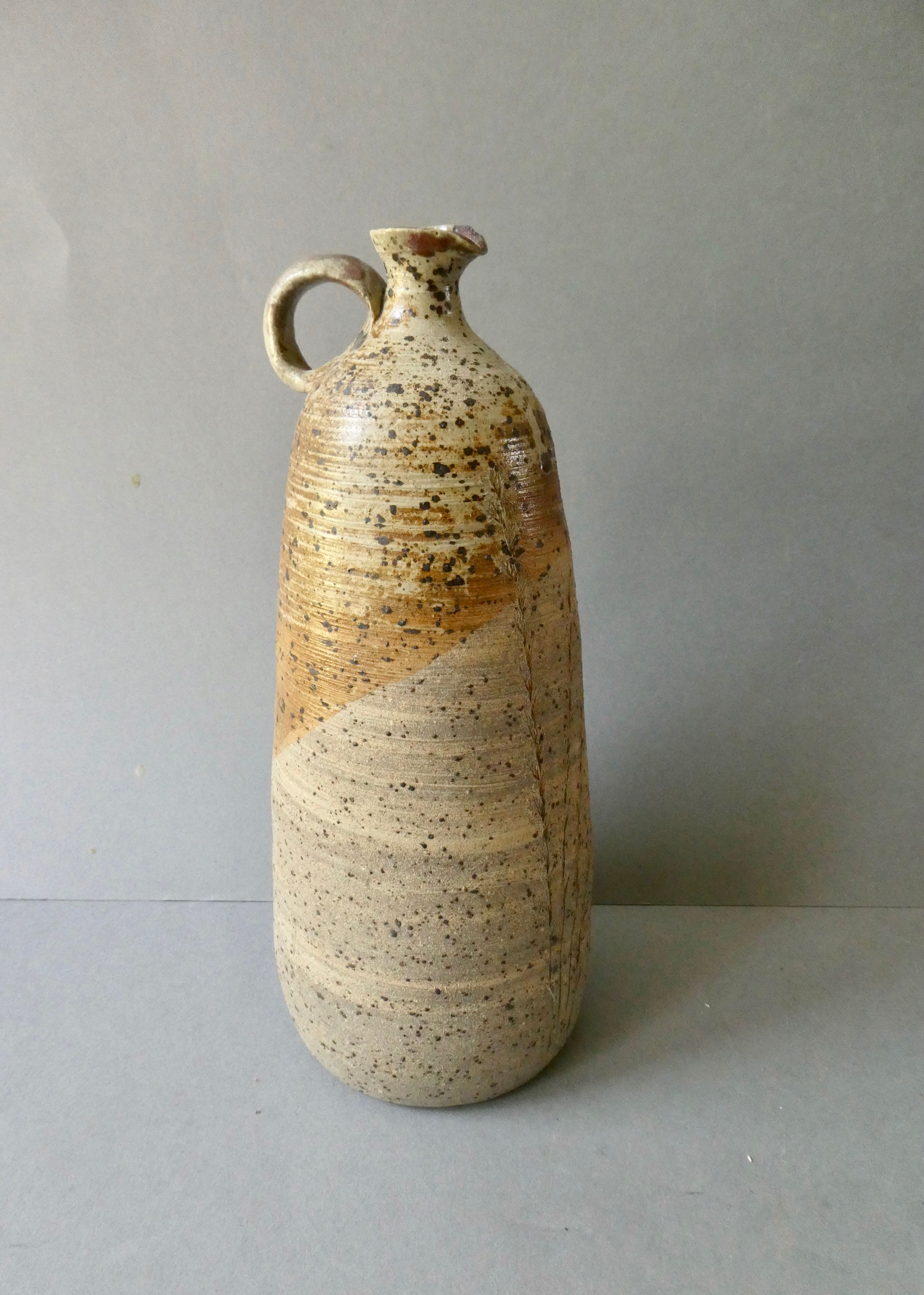 Stoneware bottle vase decorated with herbarium by Carole Boissière