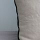 Embroidered linen cushion