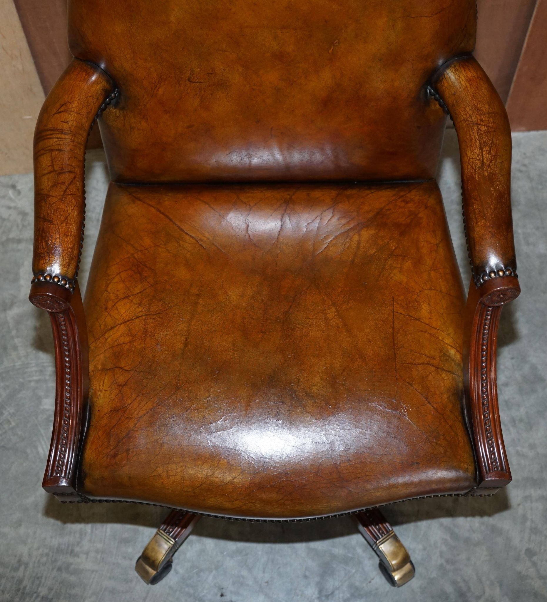 Restored vintage executive chair, leather, oak frame.