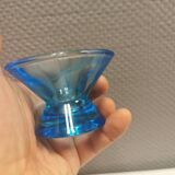 Two small candle holders in blue glass from the well-known Finnish company Ittala.