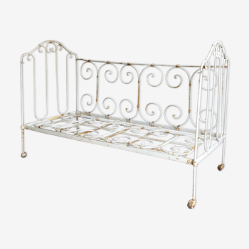 Old wrought iron baby cot