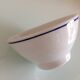 White bowl with blue border of the faienceries of Sarreguemines