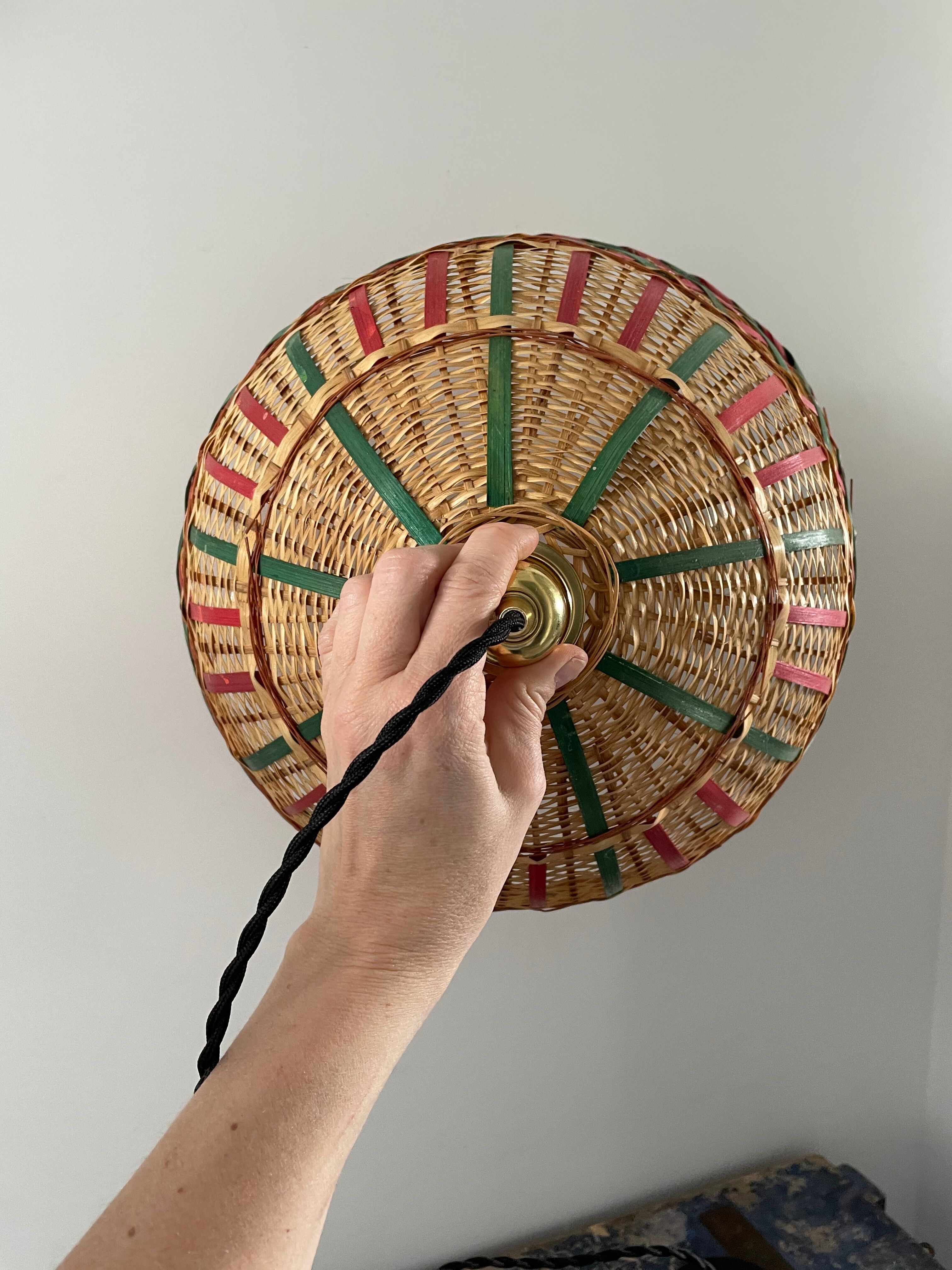 Vintage suspension in electrified braided wicker to nine
