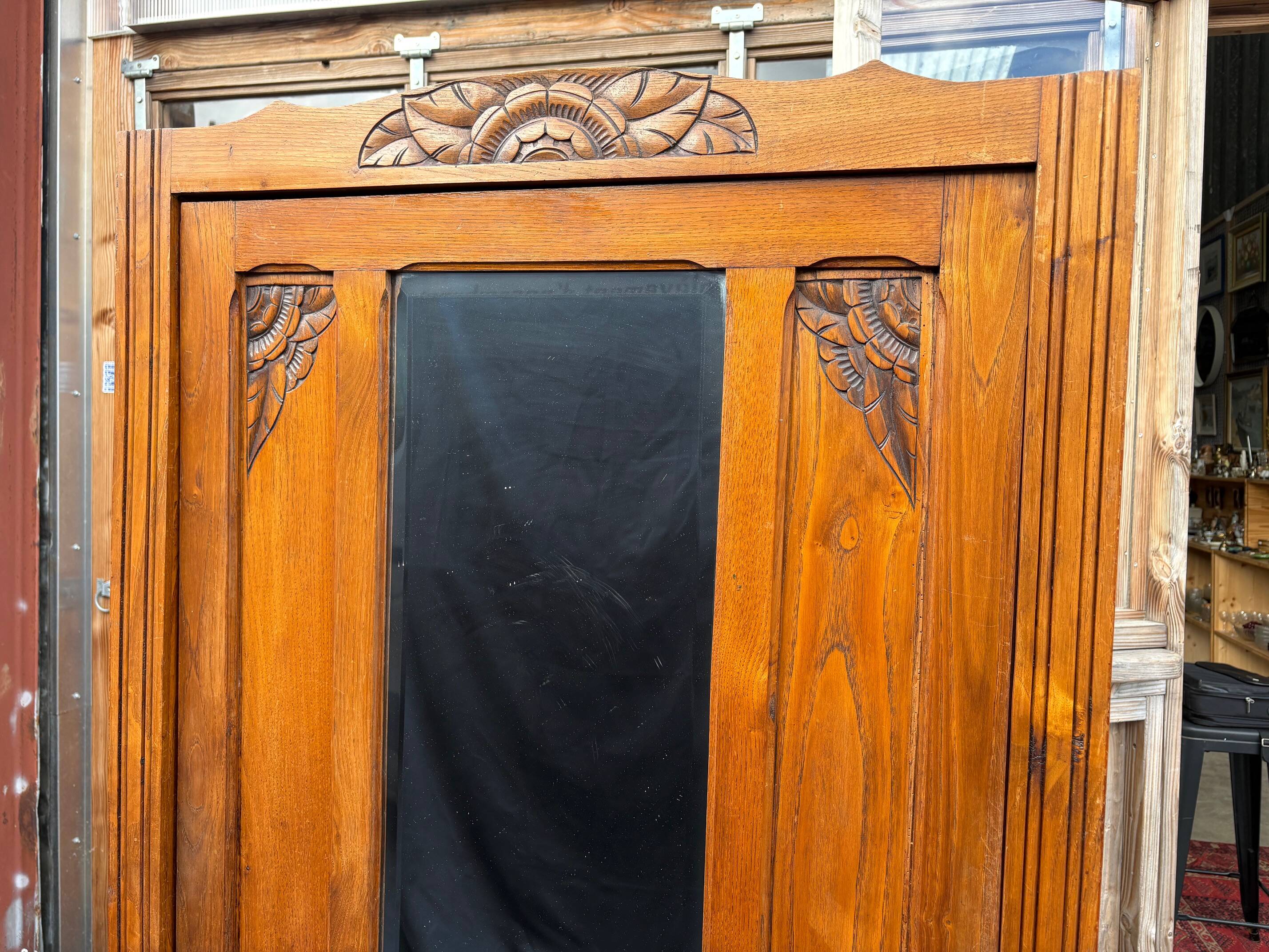 /Art Deco wardrobe with mirror in carved solid oak from the 20s/30s