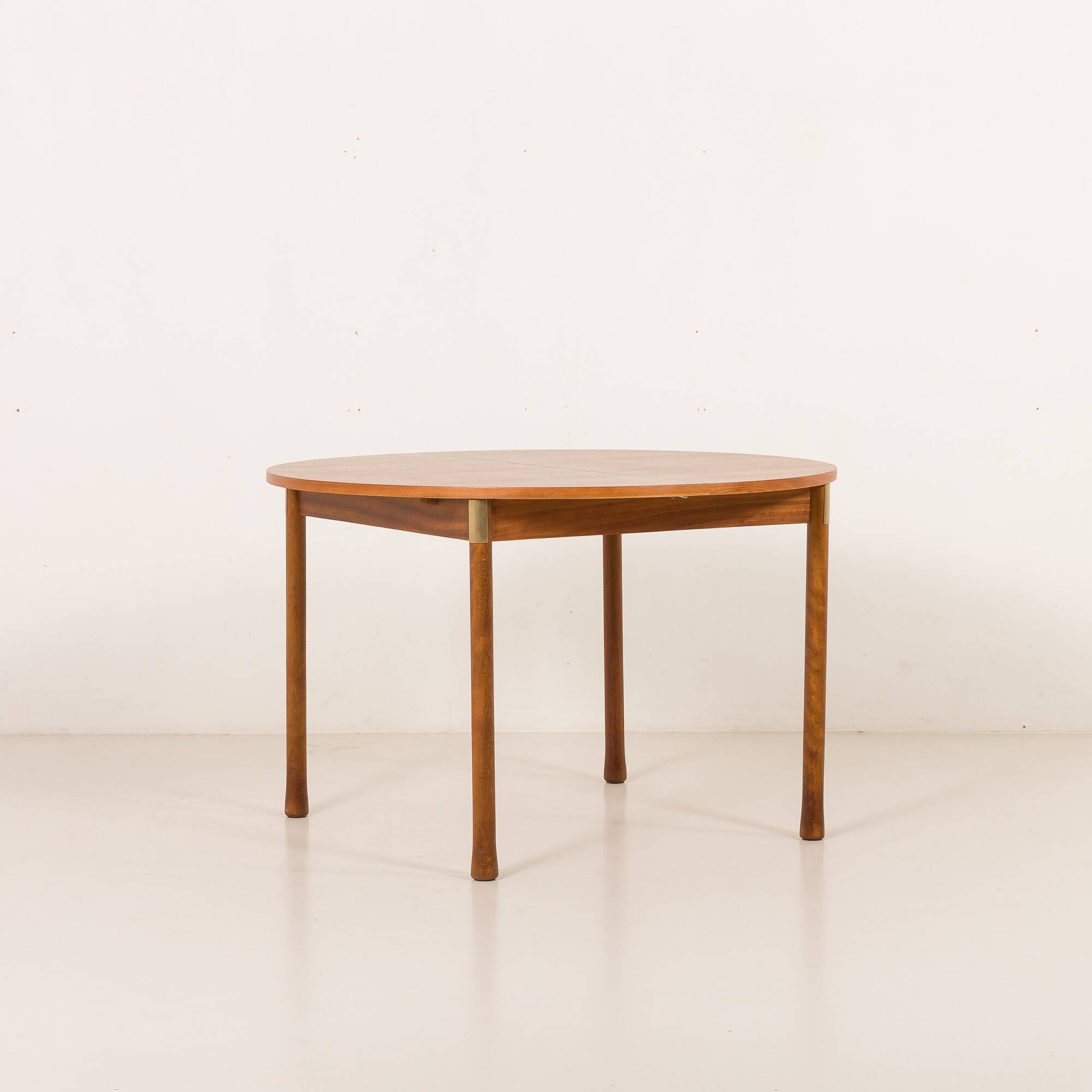 Italian mid-century round extension teak table with brass details, 1960s