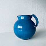 Old pitcher in glazed stoneware