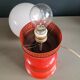 Vintage globe lamp with a metal base, perforated and lacquered in red.