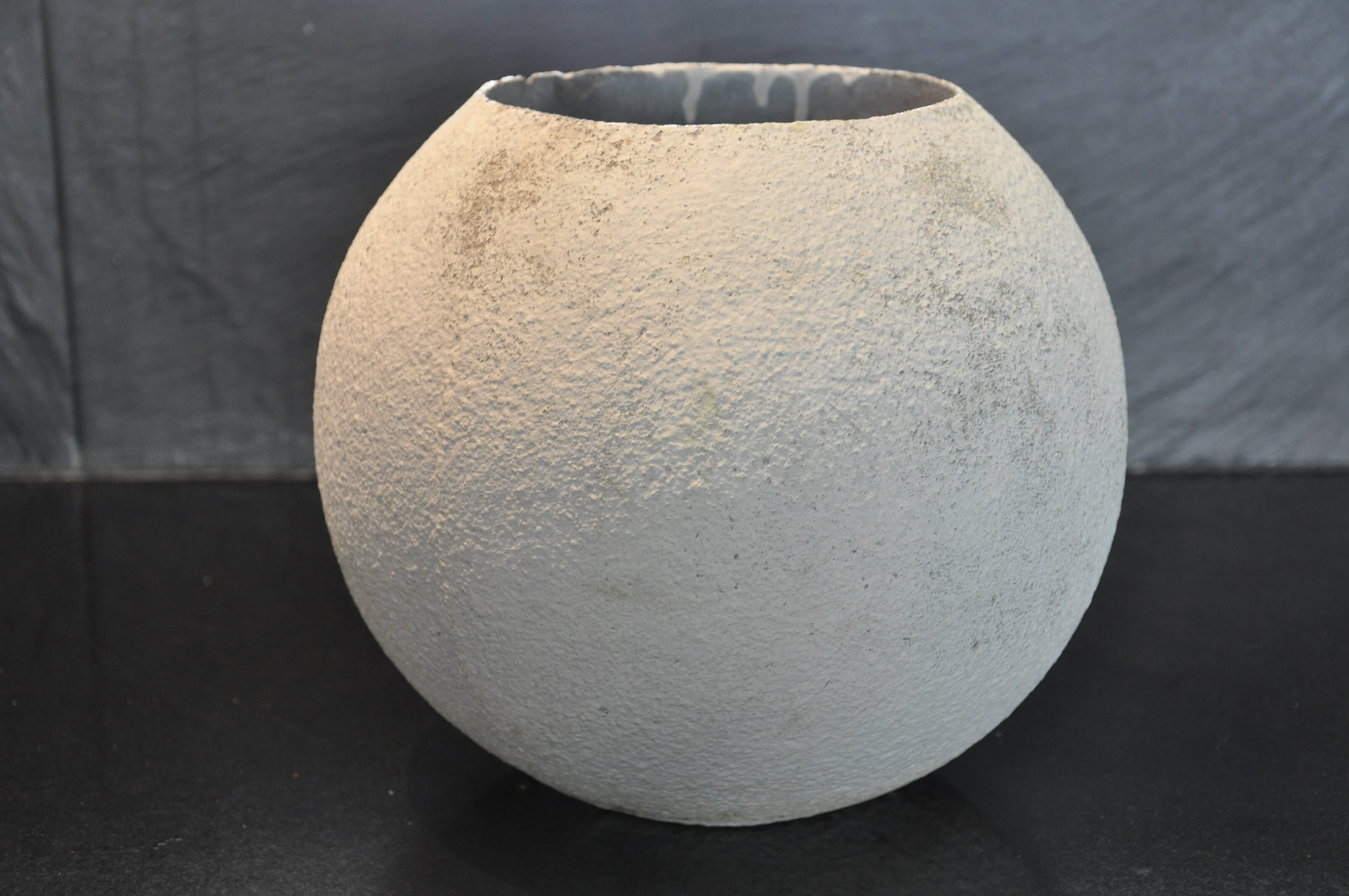 Cement ball planter from the 1960s