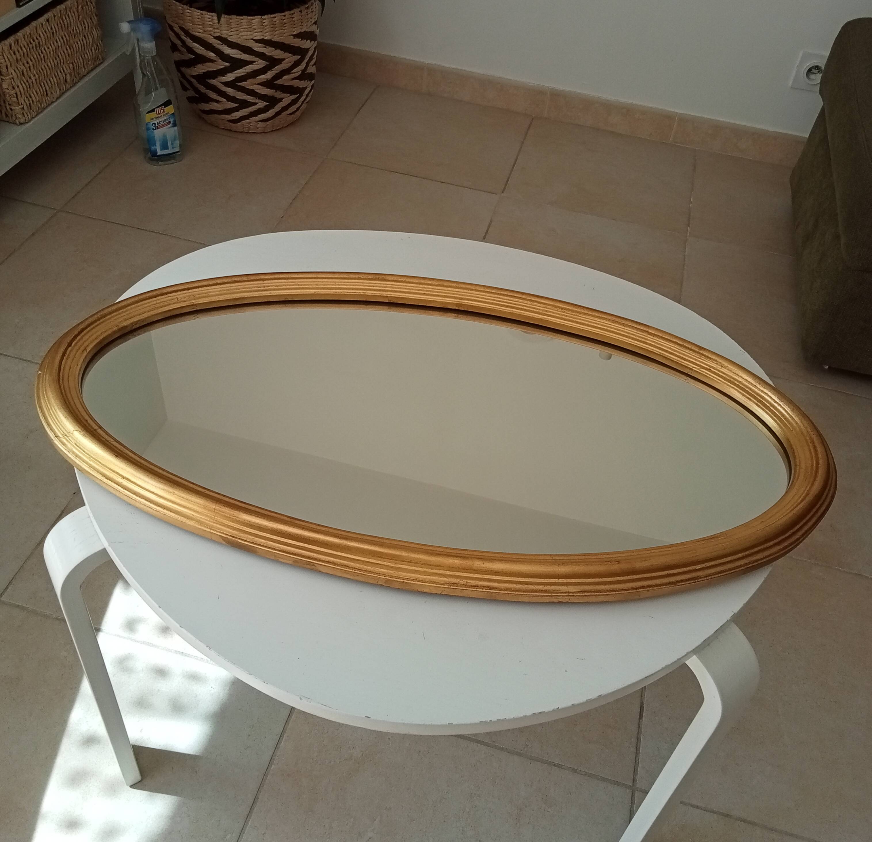 Miroir vintage ovale en bois doré années 60 77*41 cm