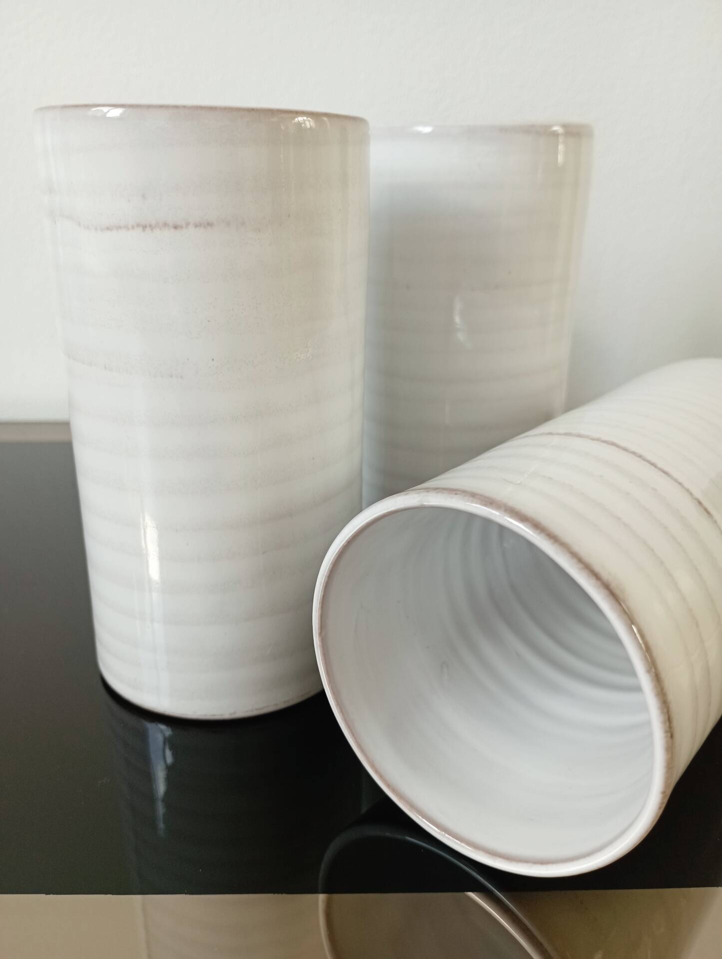 4 vintage stoneware cups in white