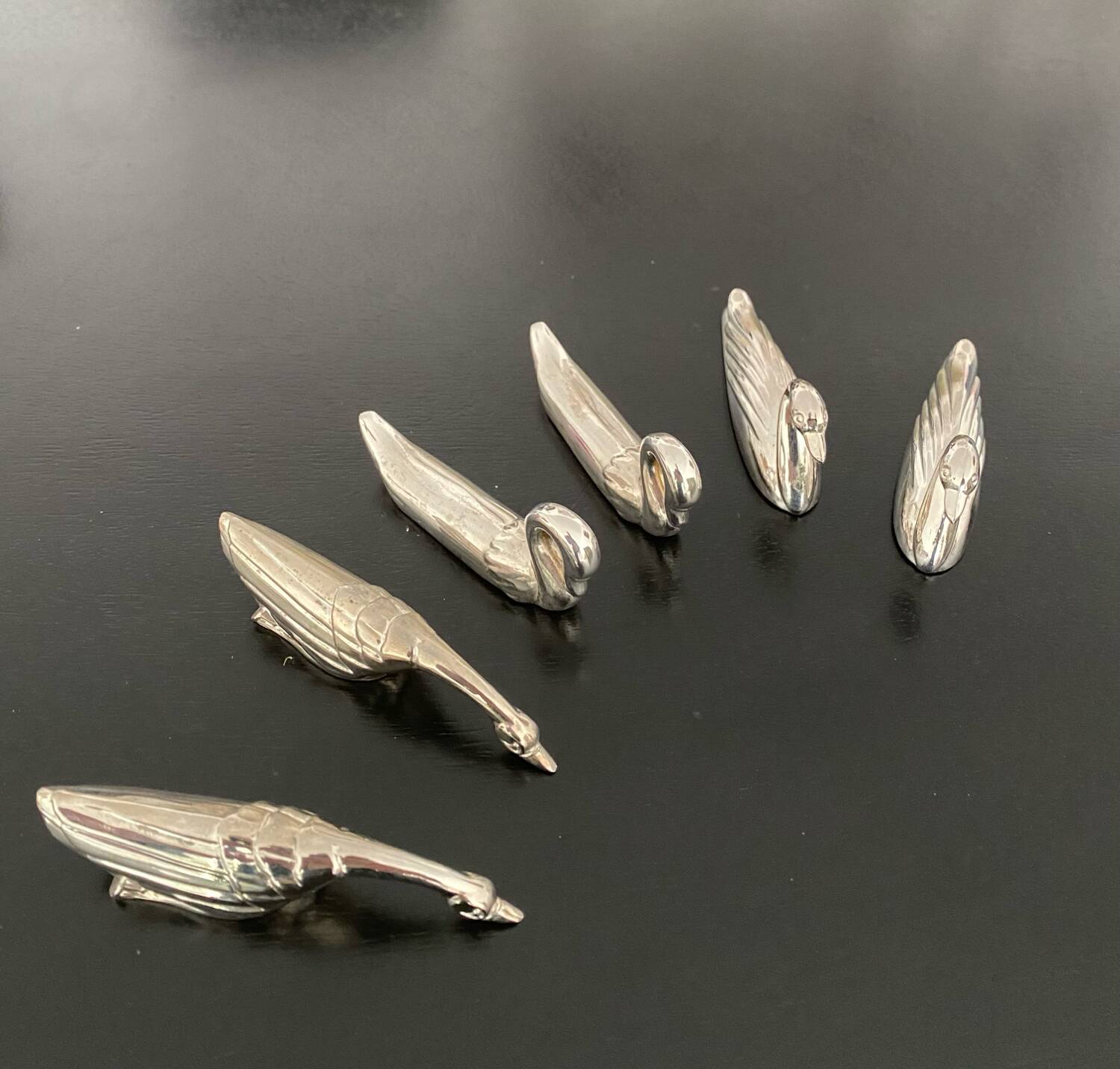 6 various animal knife holders in silver-colored metal