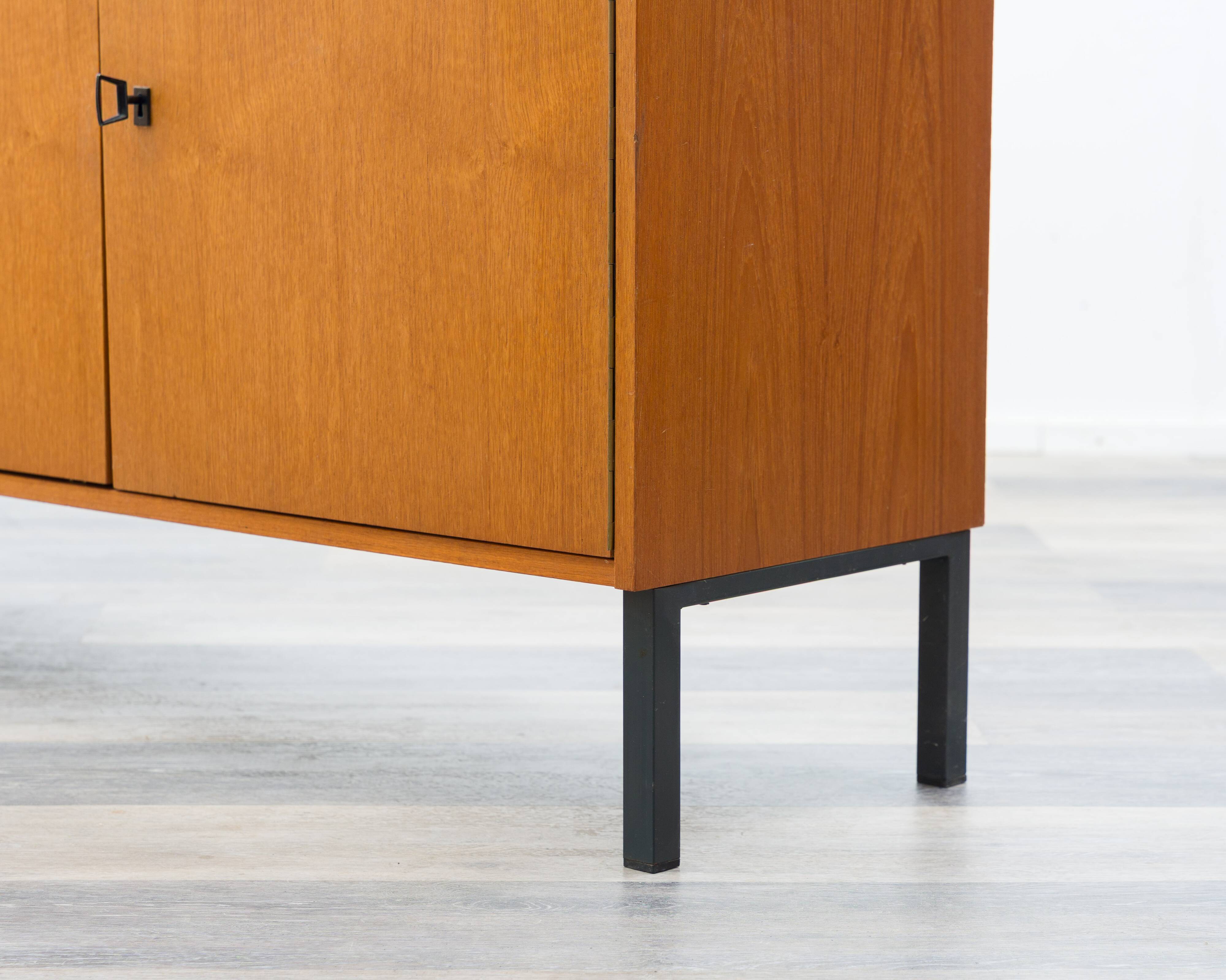 Teak sideboard with grooved drawers, 1960s.