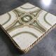 Ceramic tile trivet with vintage pattern woven wicker outline