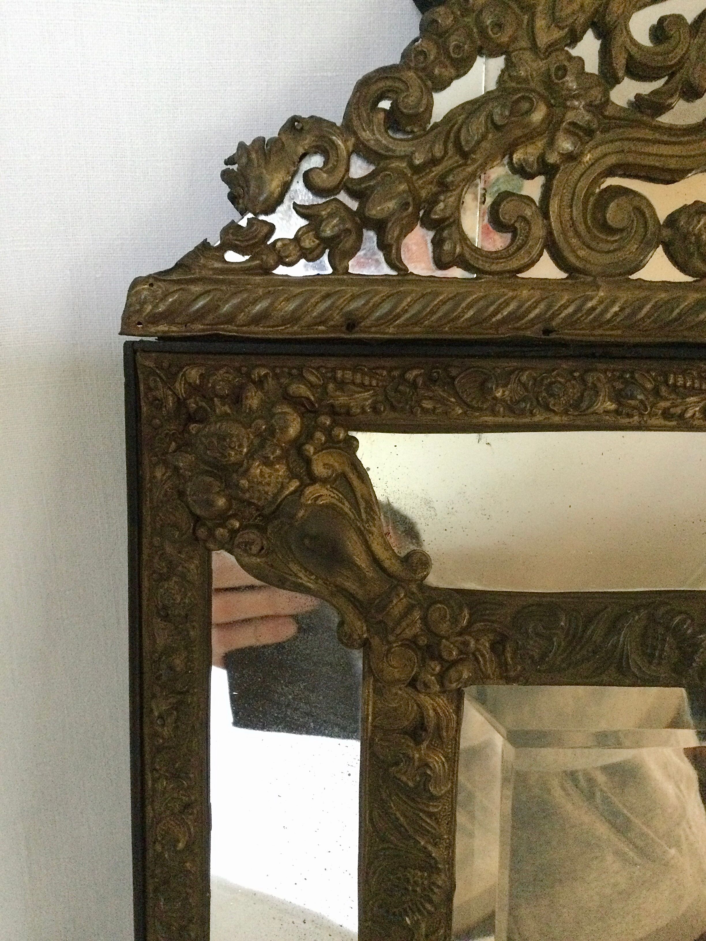 19th century embossed brass mirror with bead - 65x39cm