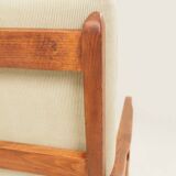 Vintage armchair in olive corduroy with a wooden frame.