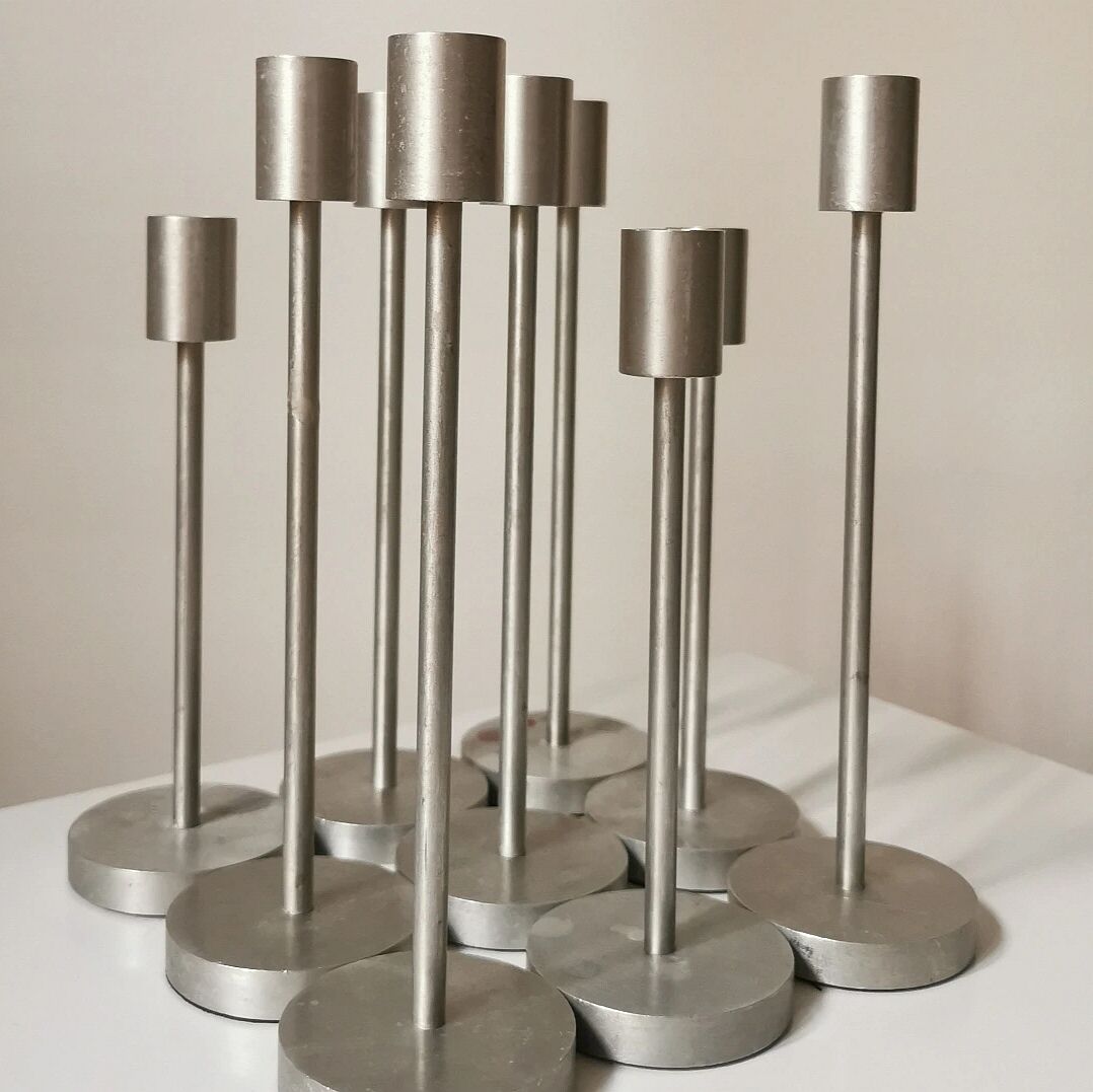 Set of 10 aluminium candle holders.