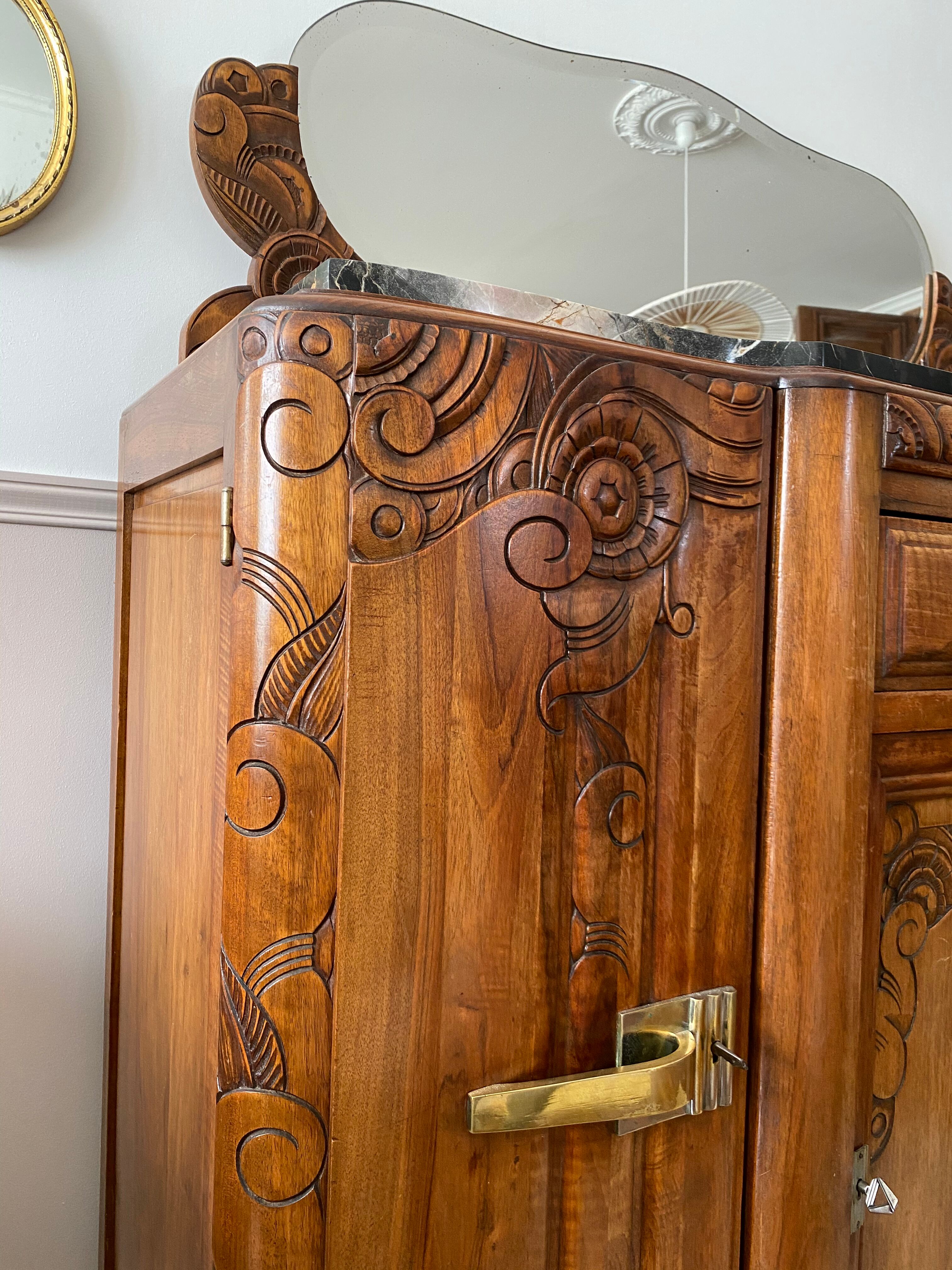 Art Deco black marble sideboard and vintage beveled mirror