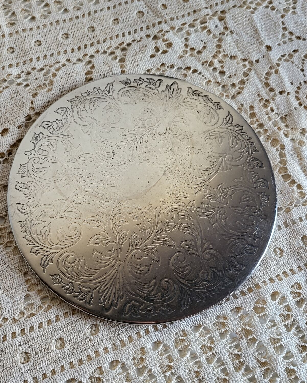 Silver-plated metal trivet English