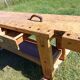 Old solid wood carpenter's bench with 2 functional vices.