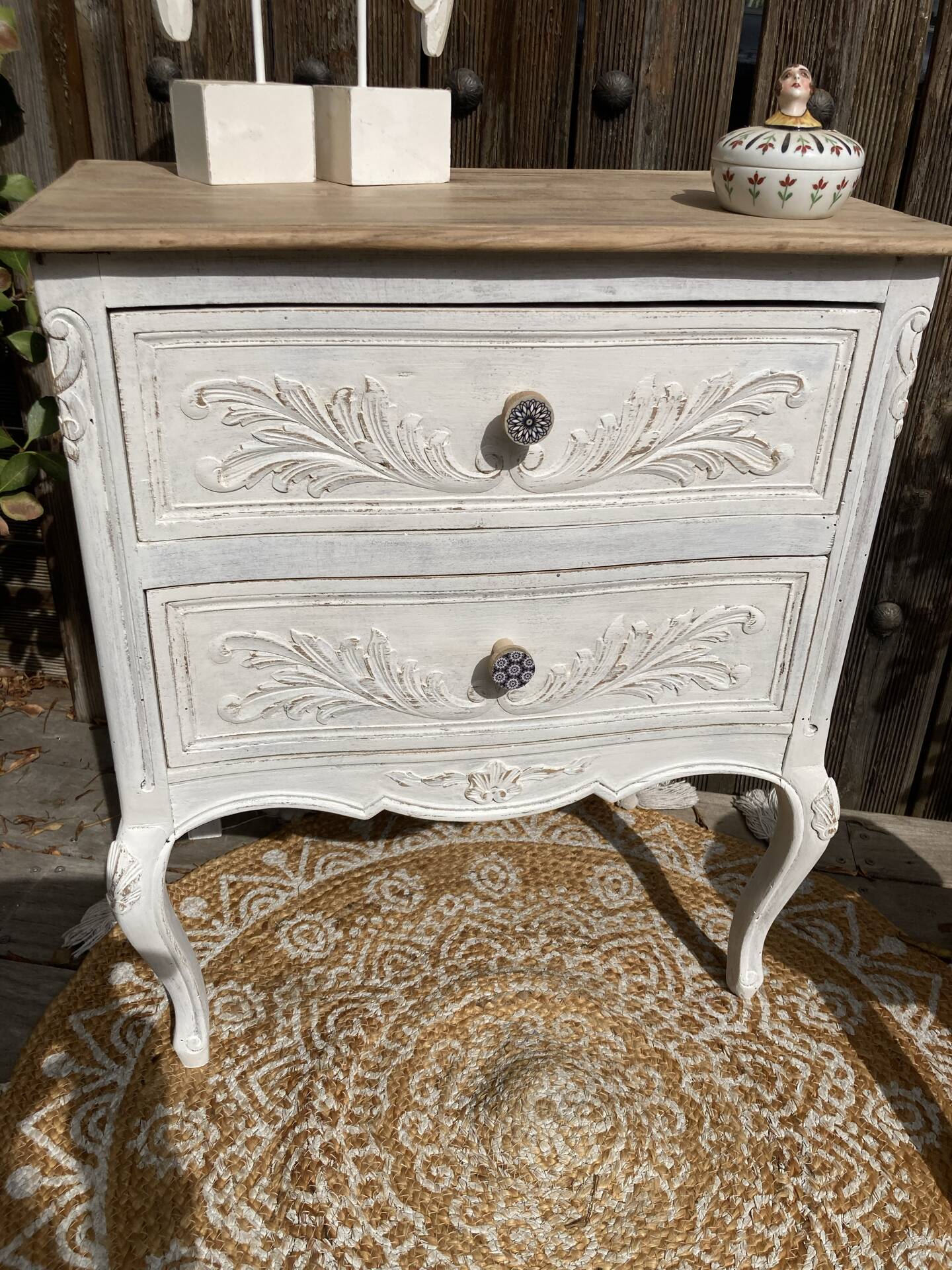Adorable small chest of drawers or weathered white console.