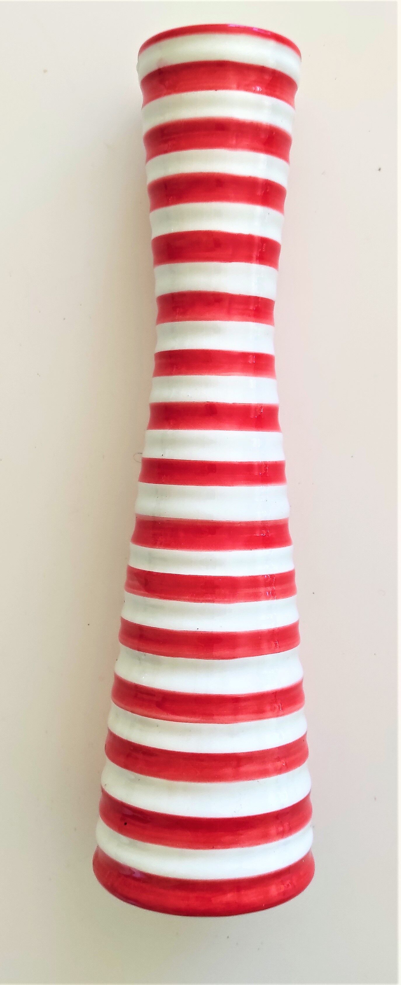 Red and white ceramic vase with vintage embossed mark
