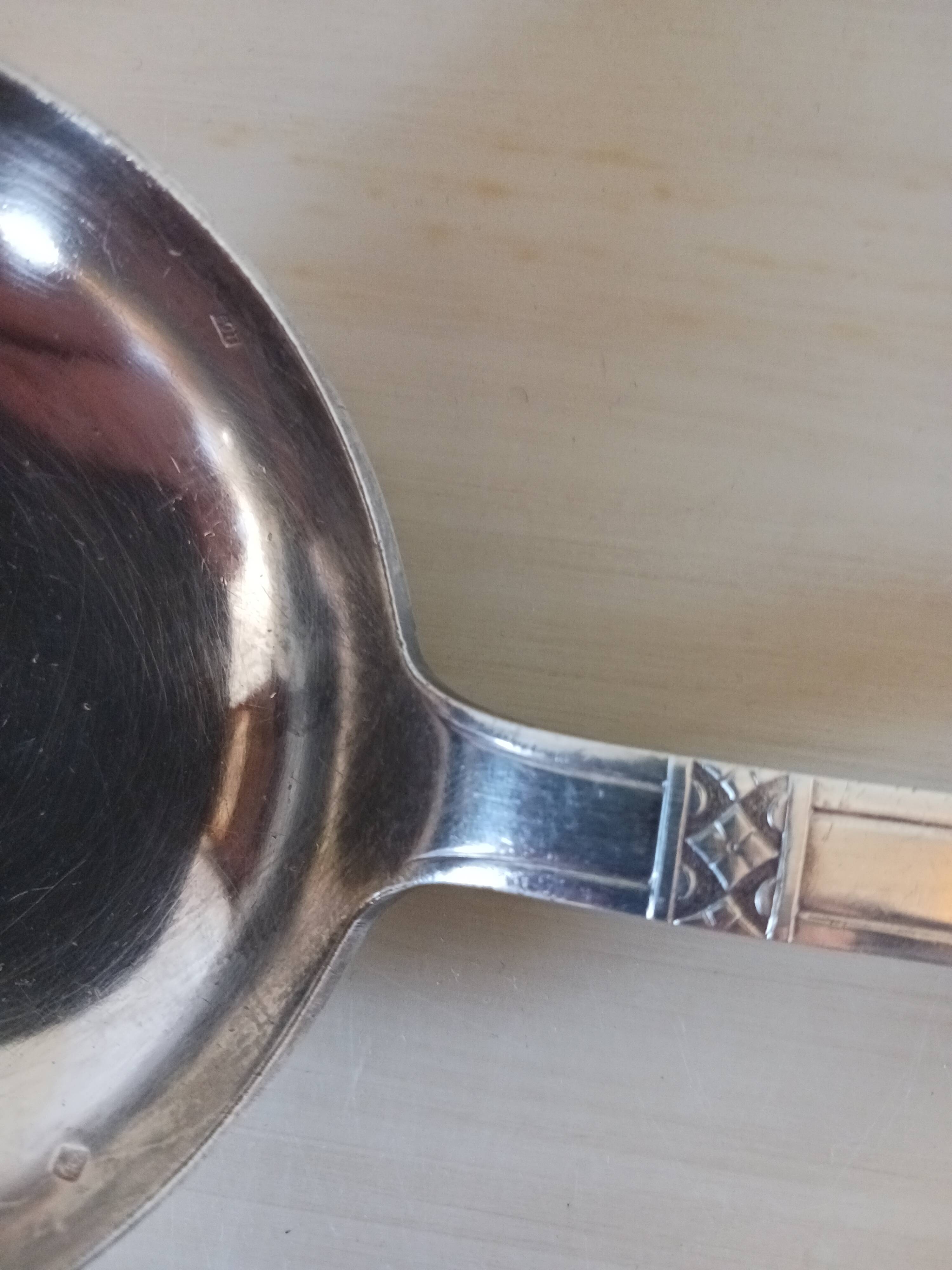 Silver-plated metal ladle, art deco motif.