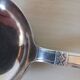 Silver-plated metal ladle, art deco motif.