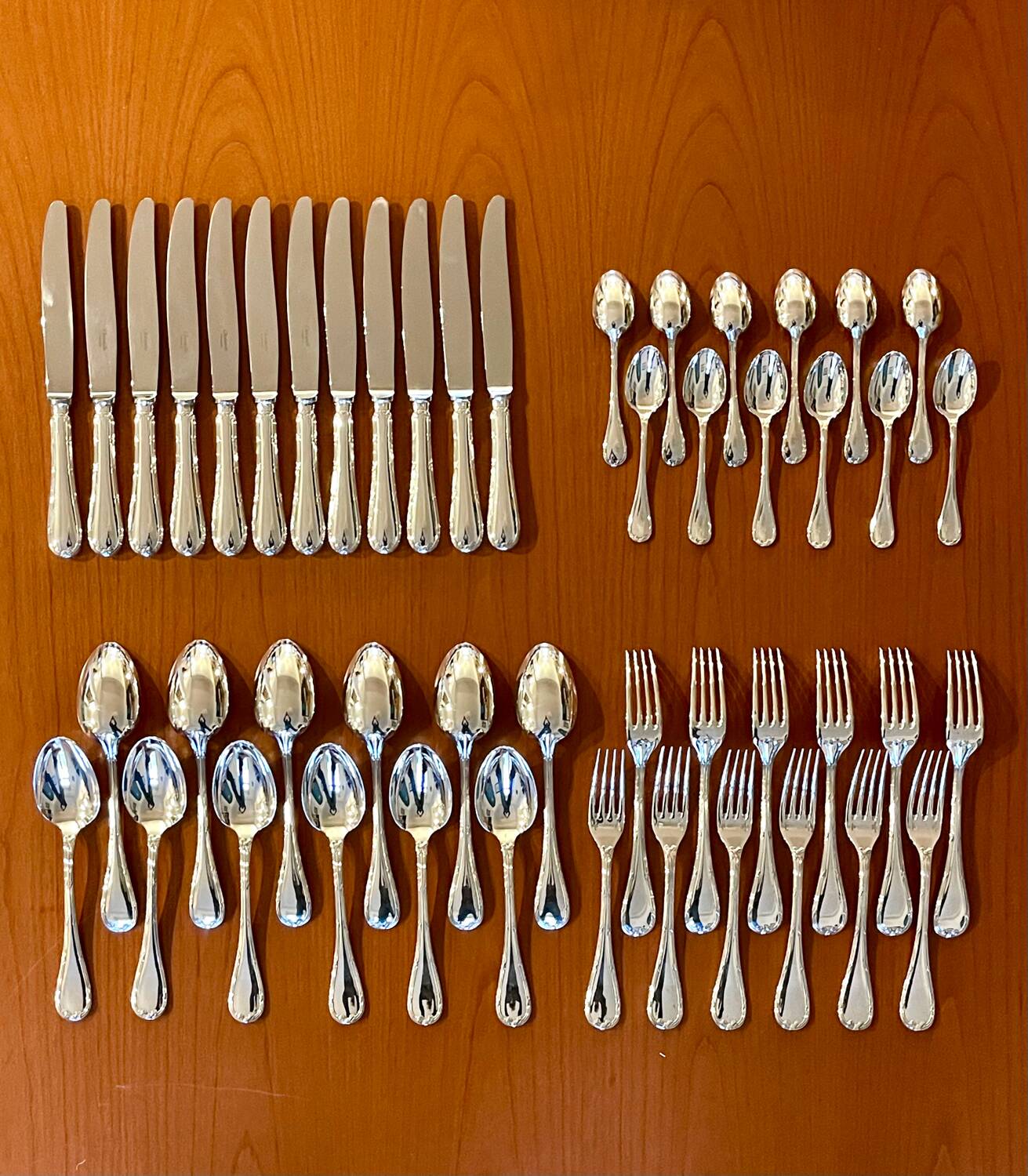 Christofle 48-piece flatware ribbon set, near mint condition