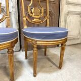 Paire de chaises style Louis XVI en bois doré