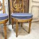Paire de chaises style Louis XVI en bois doré