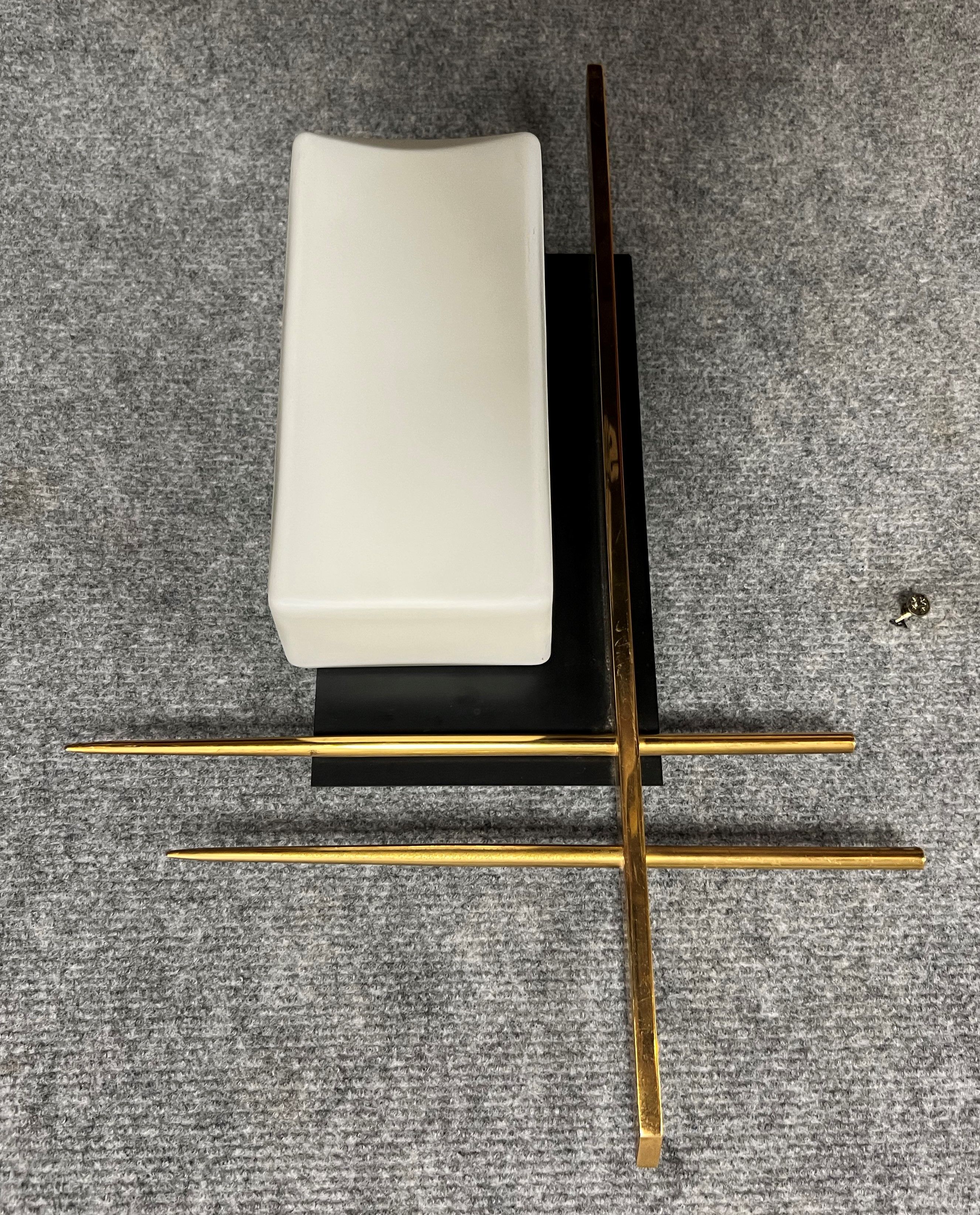 Wall lamp in black wood, gilded brass and opaline
