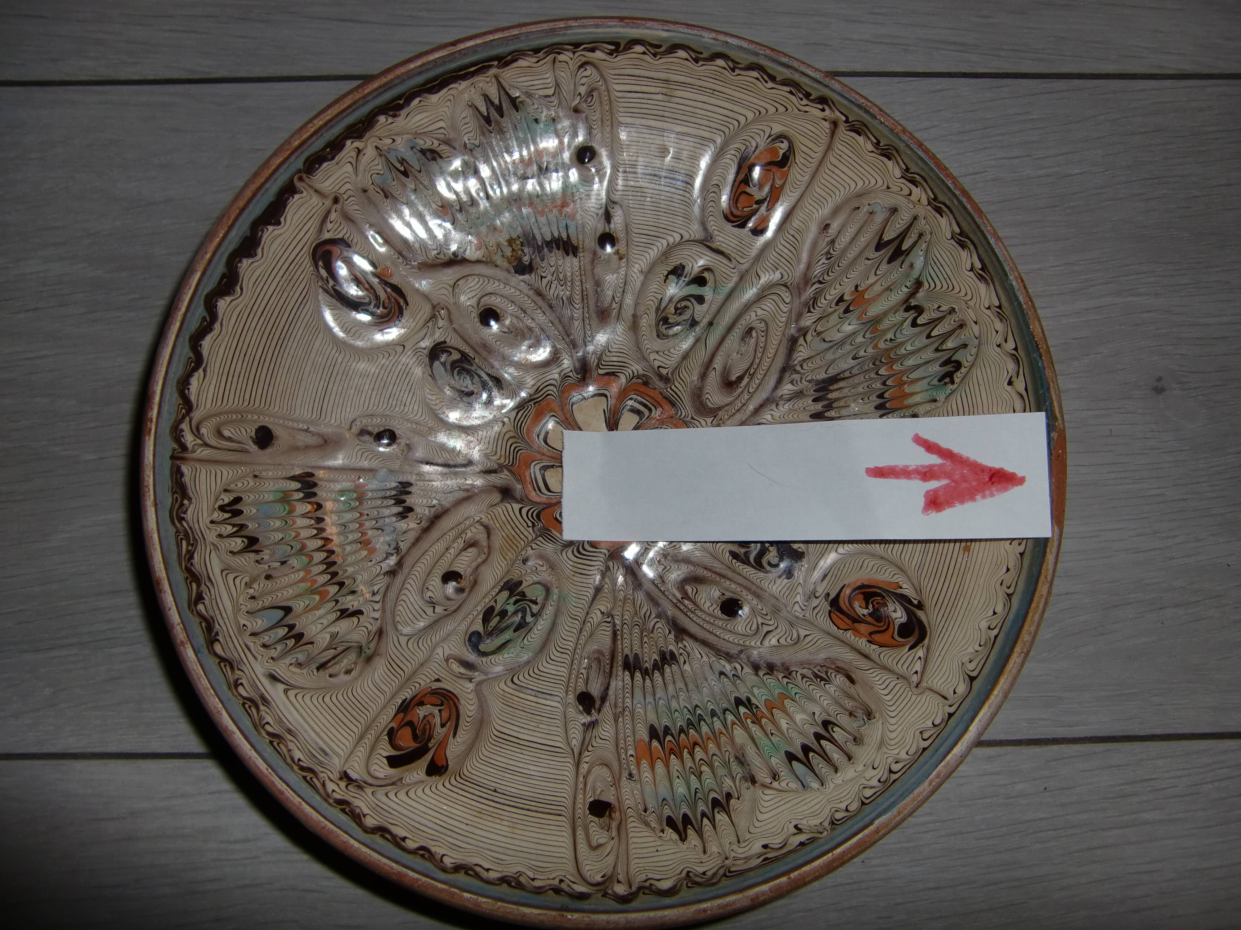 Hand decorated terracotta plate