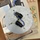 Small ceiling light with a mother-of-pearl shade from the 1950s.