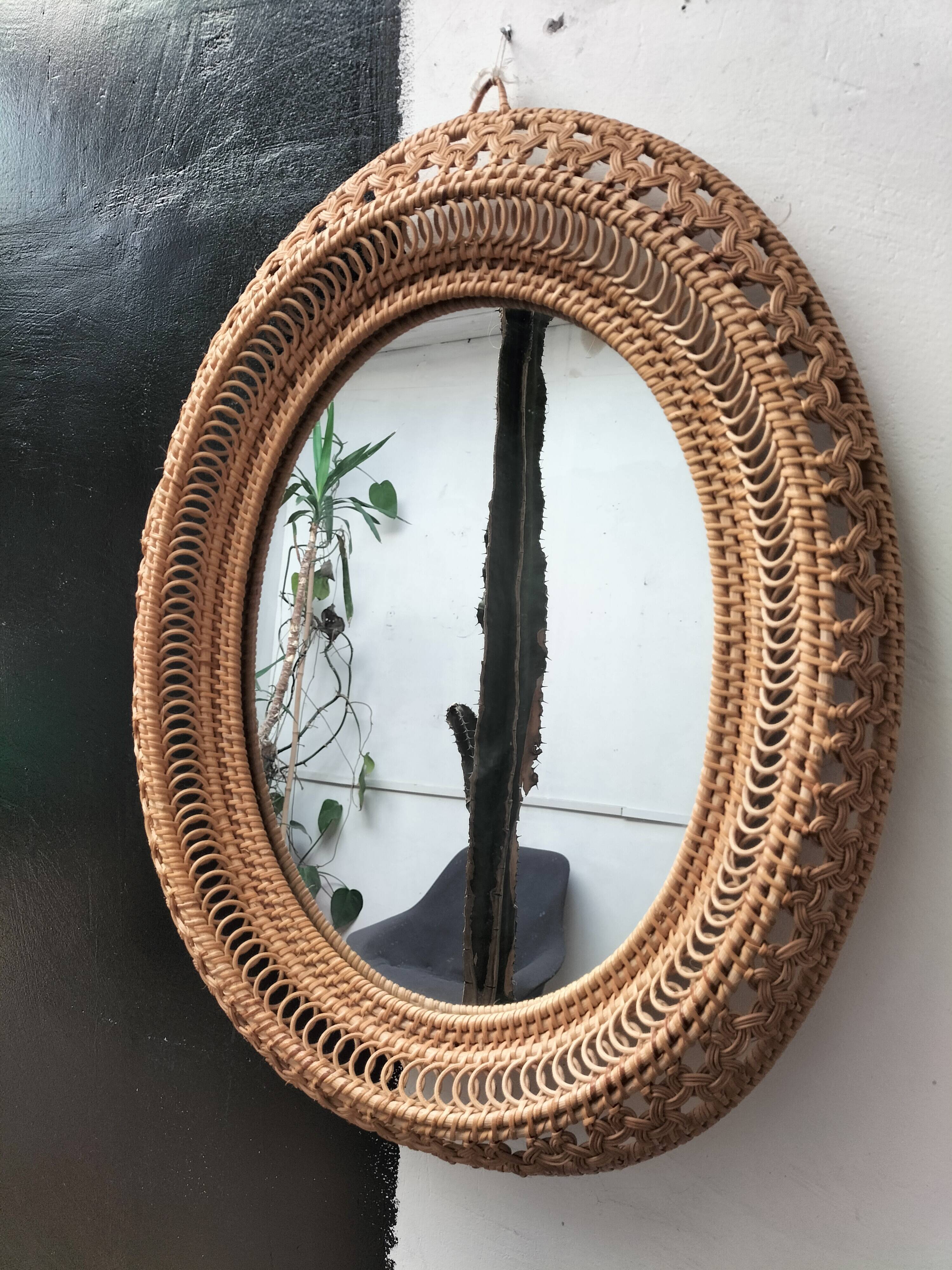 Oval rattan mirror