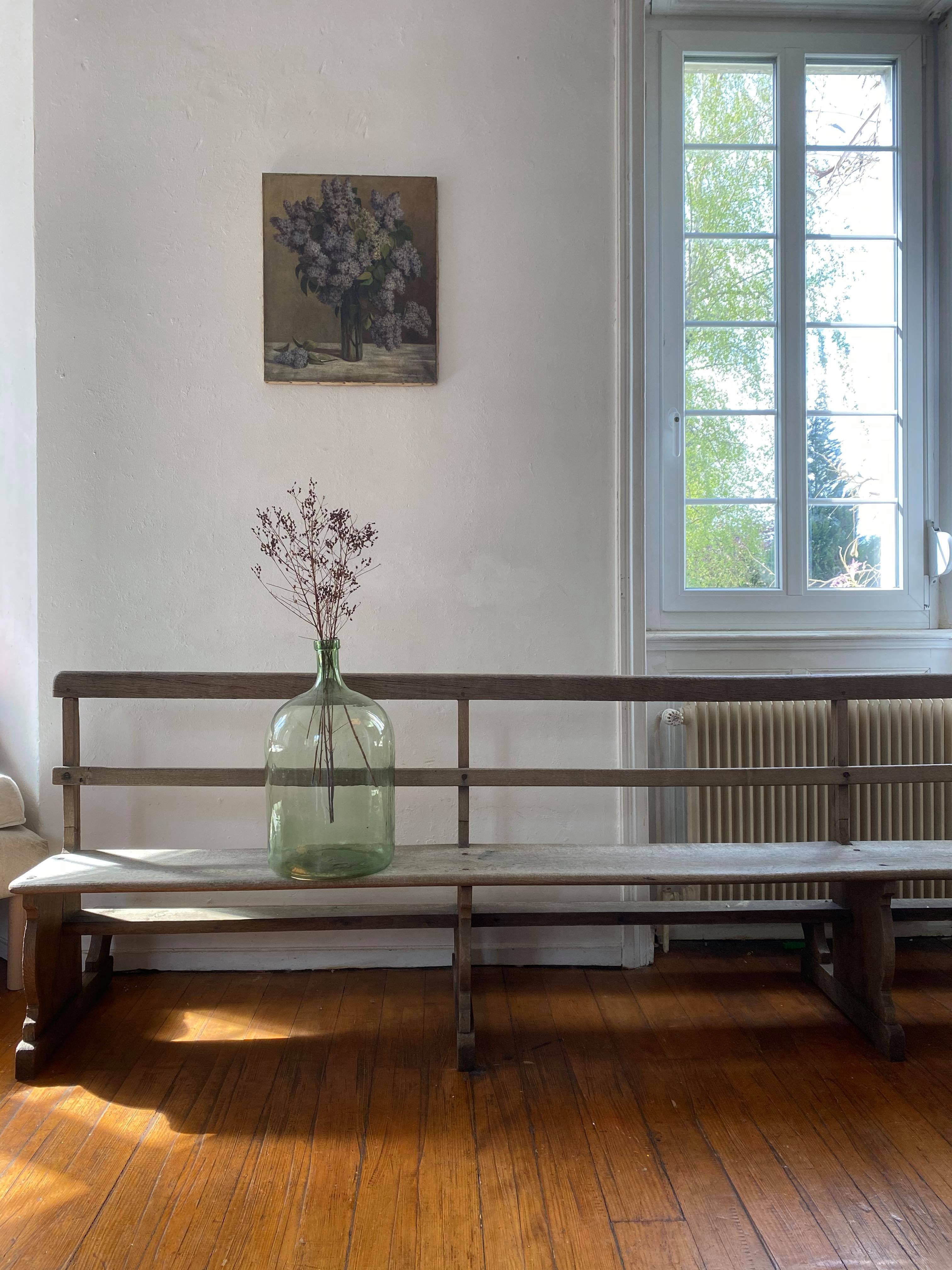 Very large church bench in patinated raw oak
