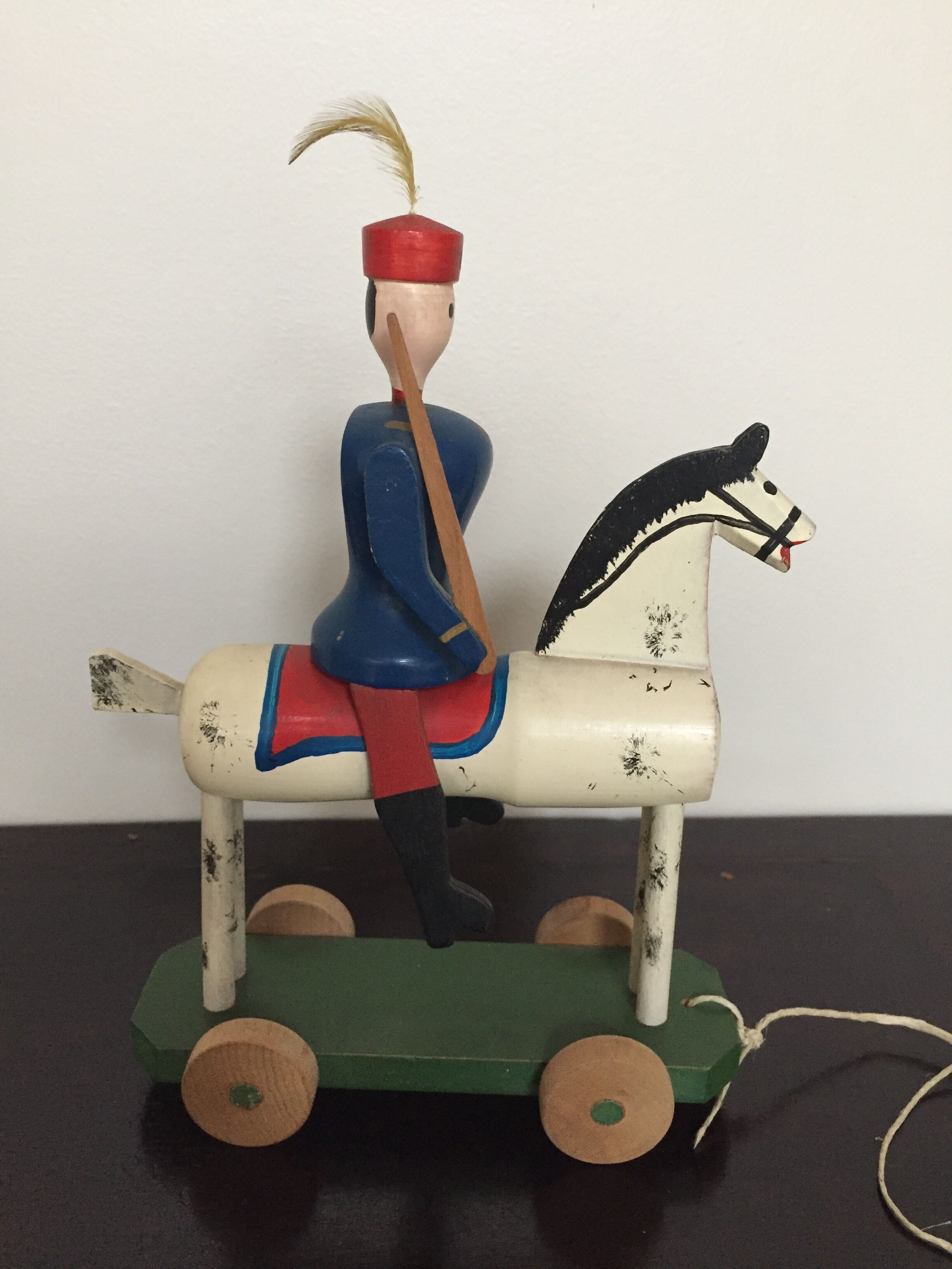 Soldier on wooden horse to shoot