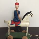 Soldier on wooden horse to shoot