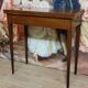 Louis XVI period game table in mahogany and marquetry.