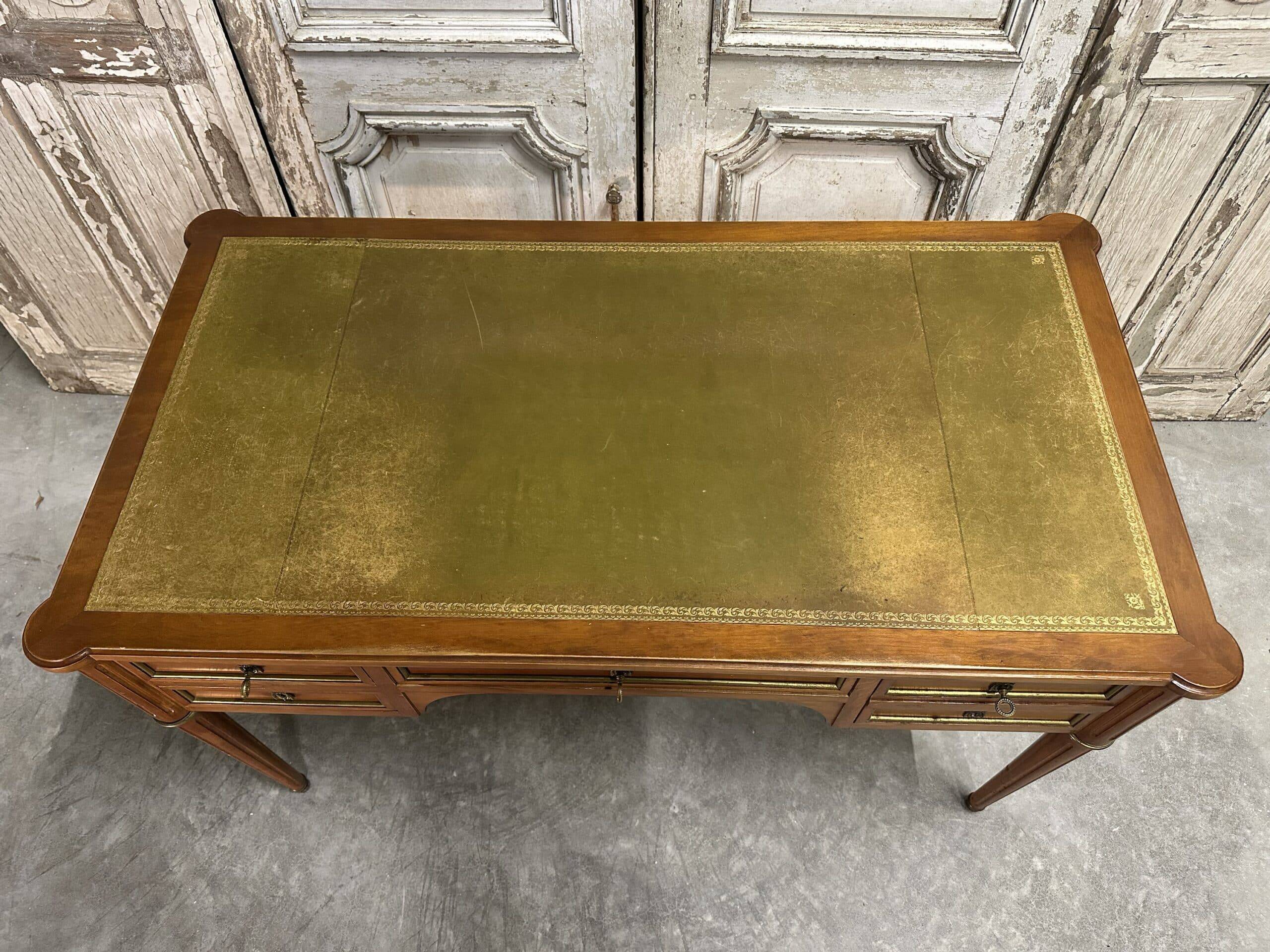 Louis XVI style flat desk in cherry wood from around 1960.