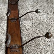 Old coat rack with metal/brass hooks