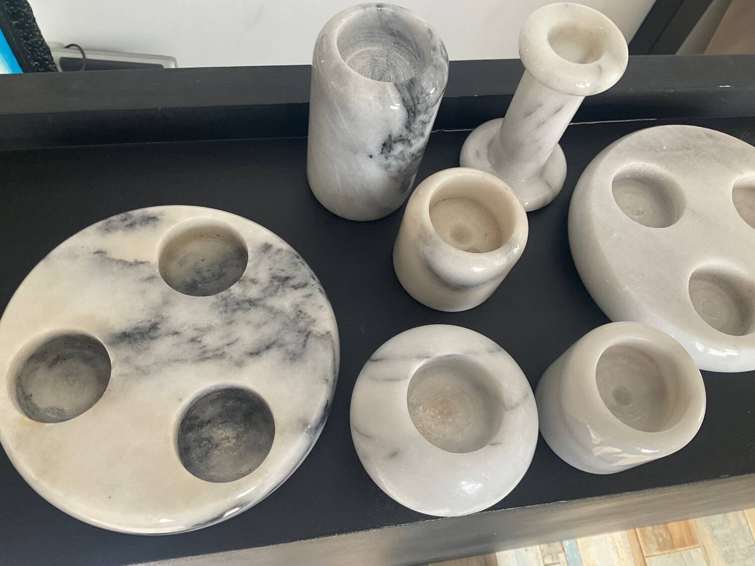 Series of 7 vintage Carrara marble candlesticks