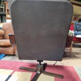 Scandinavian tilting and rotating armchair