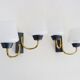 Pair of vintage Maison Arlus wall lights from the 1950s in brass, glass globe.