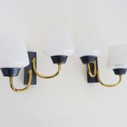 Pair of vintage Maison Arlus wall lights from the 1950s in brass, glass globe.