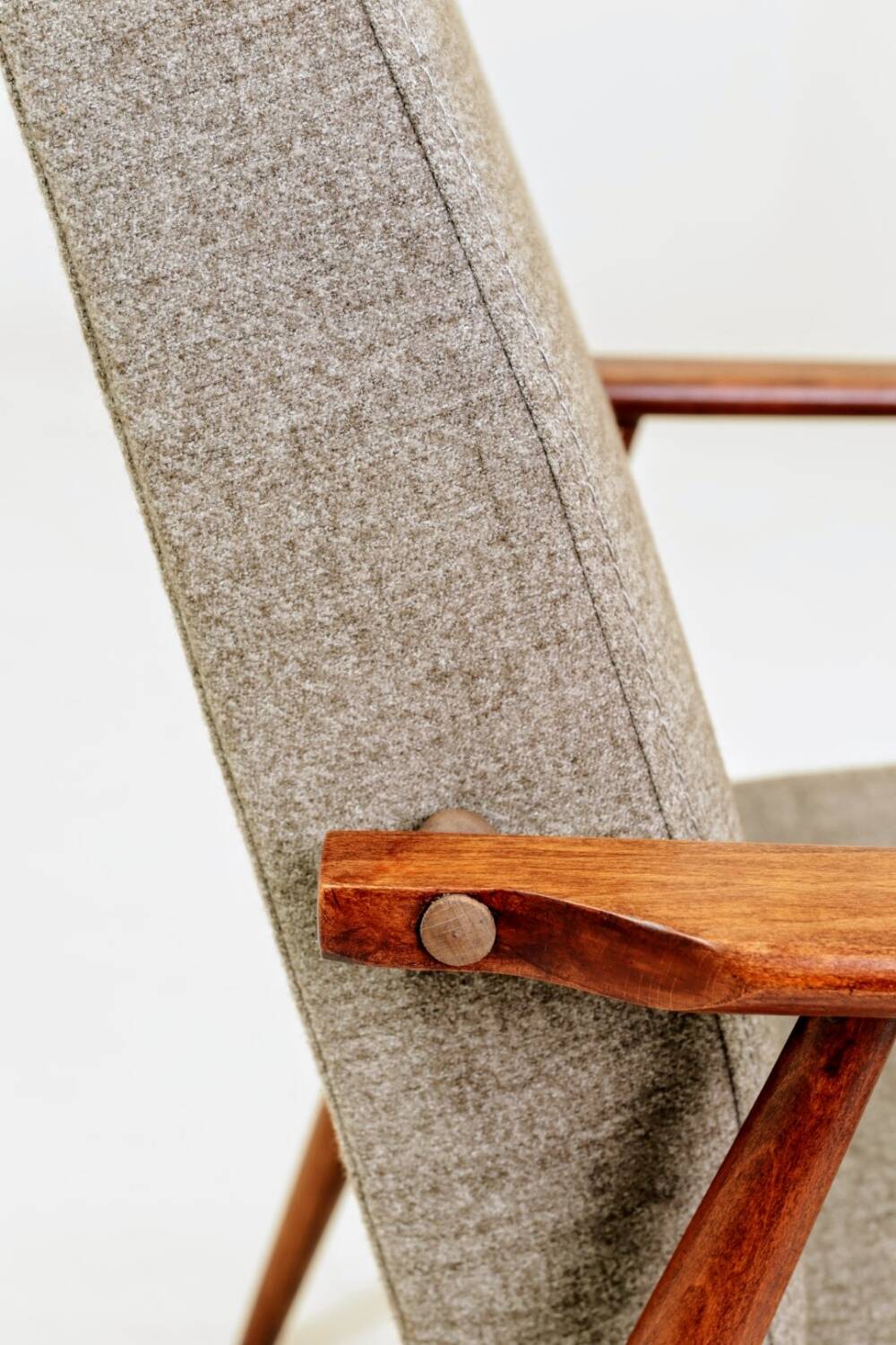 Beige mixed vintage armchair from the 1970s.