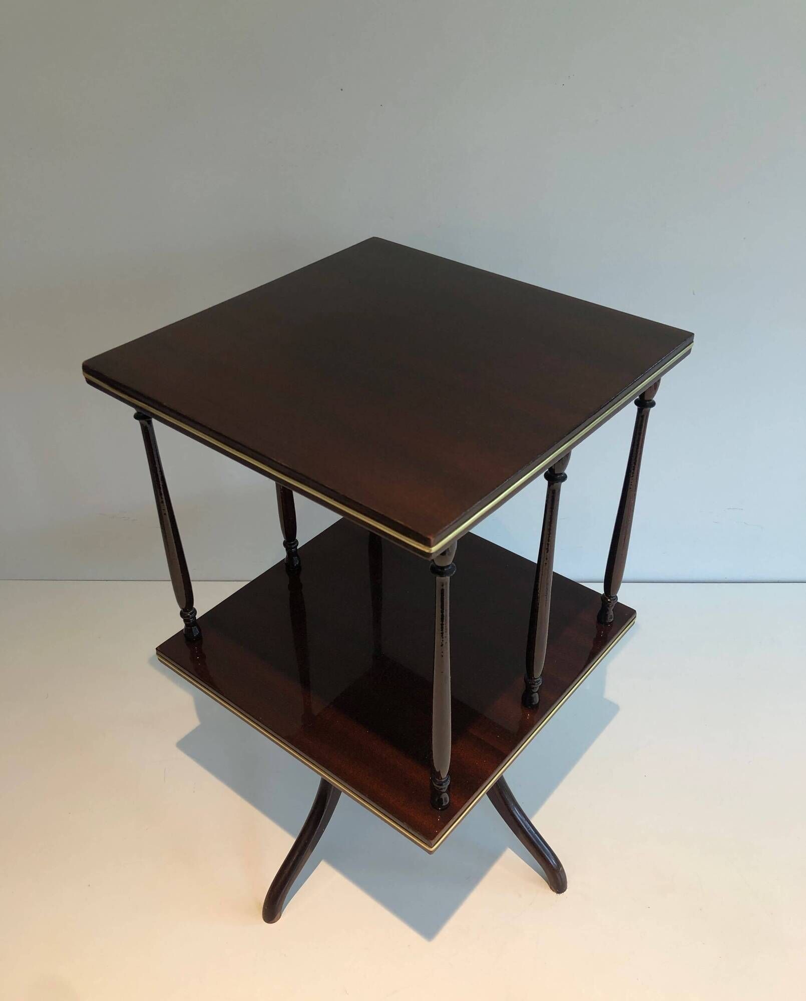 Rotating Table with Two Mahogany and Brass Platforms with Turned Columns.