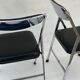 Pair of italian chrome and leather folding chairs