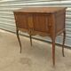 Piece of furniture with two Louis XV-style curtains.