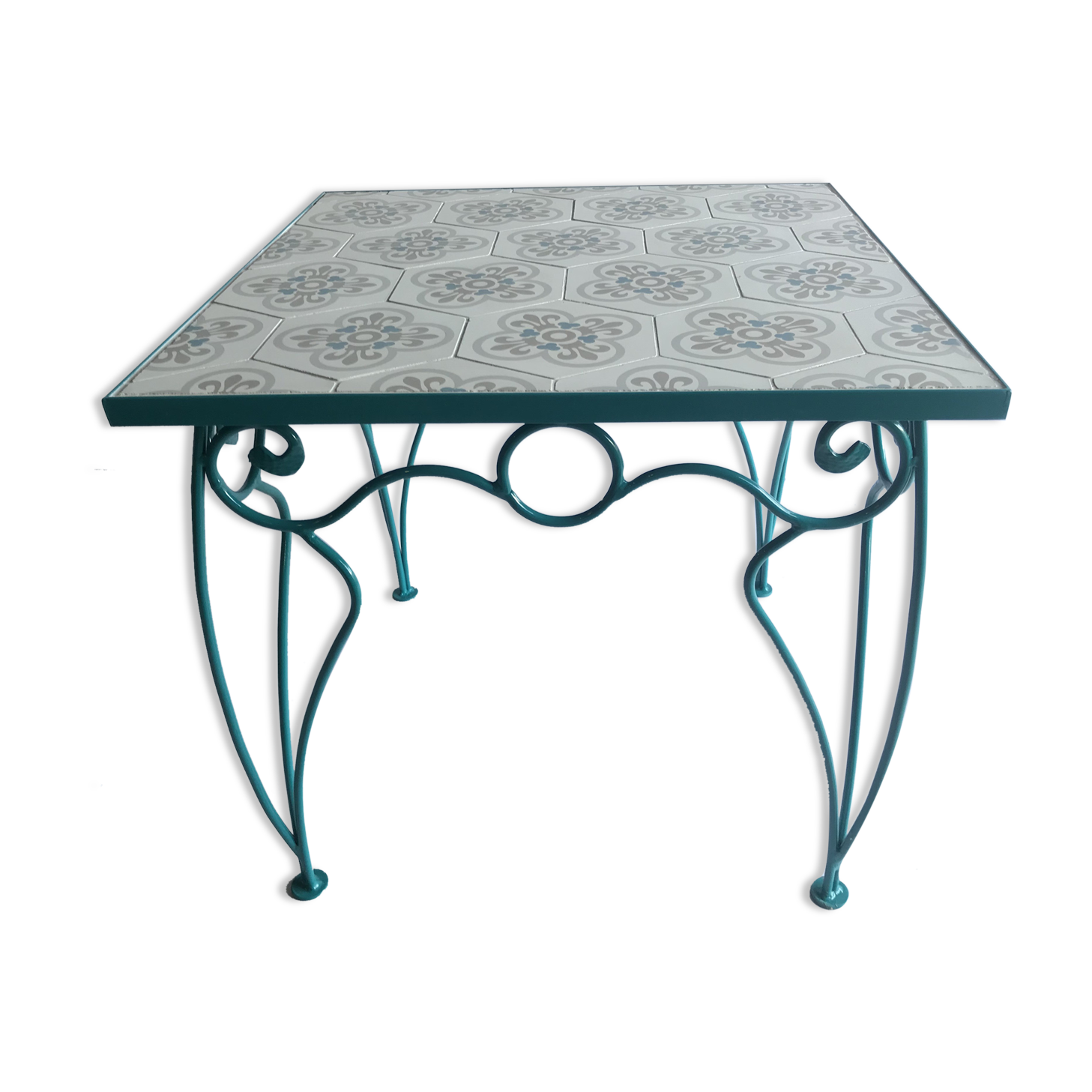 Wrought iron table and cement tile